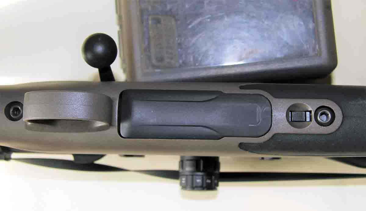 The detachable polymer magazine sits flush to the stock and holds five rounds of .270 Winchester. A knurled and recessed button in front of the magazine drops it out and into the hand slickly.